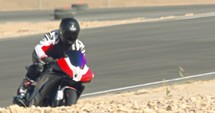 Slow motion of sport motorcycles making turns during a race