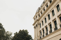 the side of a large, regal building