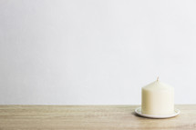 white candles and white background 