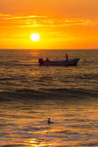 men fishing in a boat in Puerto Vallarta