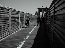 pedestrians on the Brooklyn bridge 