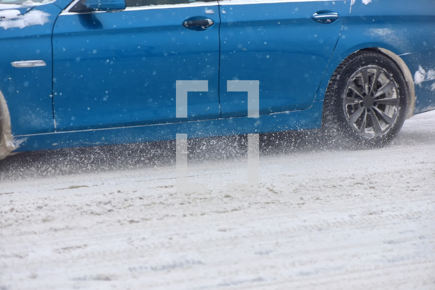 car driving through snow 