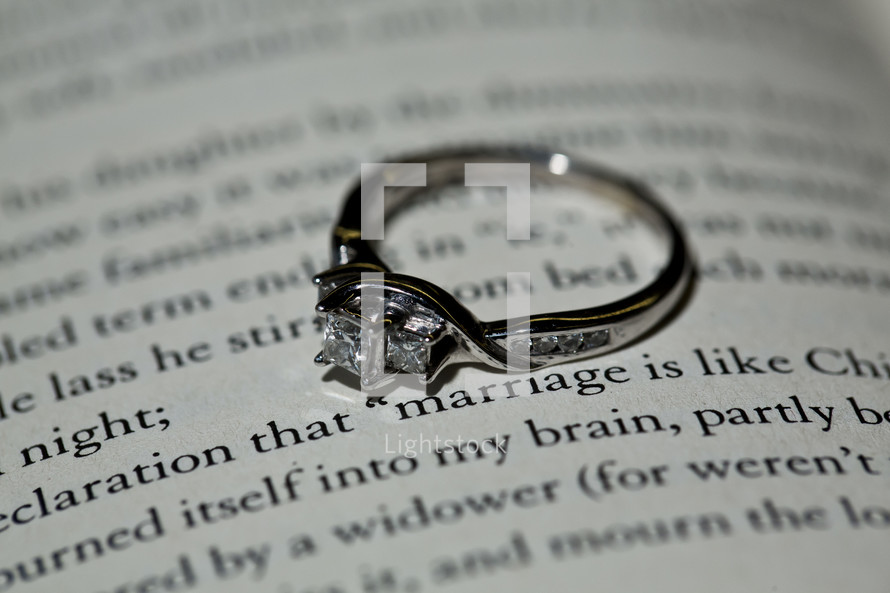 engagement ring on a Bible 