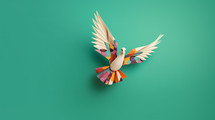 Colorful paper machete flying dove on a teal background.