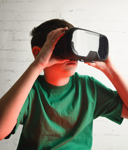 child wearing VR glasses 