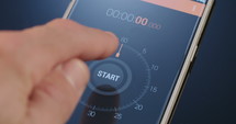 Digital timer counting on a smartphone screen