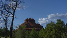Timelapse of clouds over a red sandstone butte in the American southwest