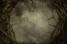 a crown of thorns on a dark grunged background.
