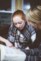 two women reading Bibles 