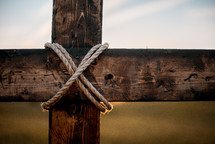 wooden cross in a field 