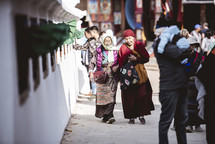 Buddhist monks walking the streets of Tibet 