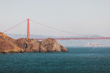 The Golden Gate Bridge with Alcatraz Prison beyond.