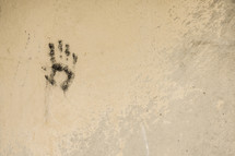 Handprint on wall