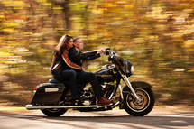 Couple riding on a motorcycle