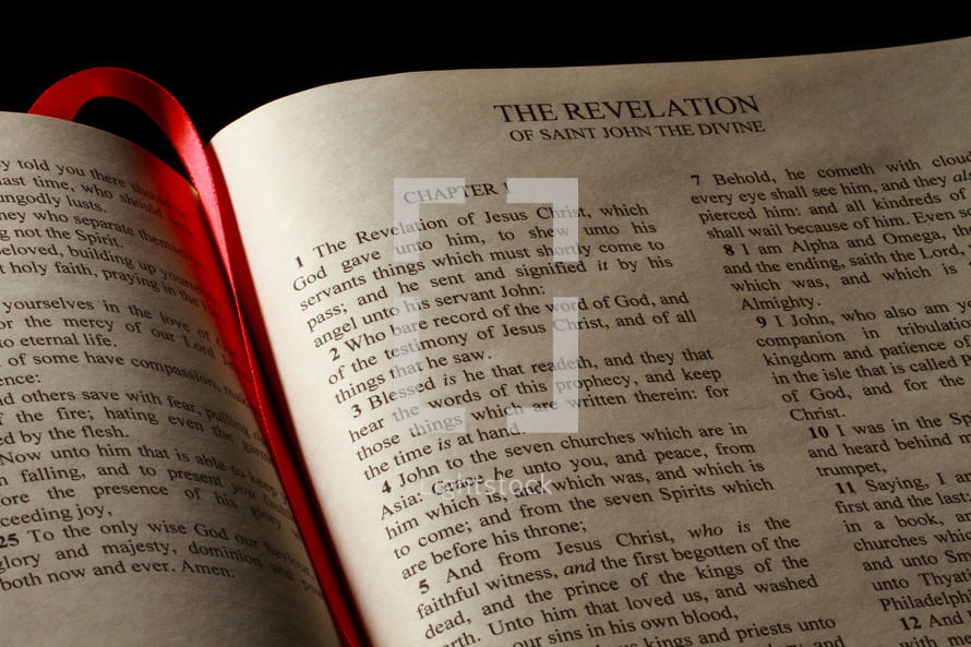 Open Bible in the book of Revelation