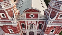 Birds eye view of the Shrine of St. Joseph Catholic Cathedral Church in Downtown Saint Louis, Missouri with green trees.