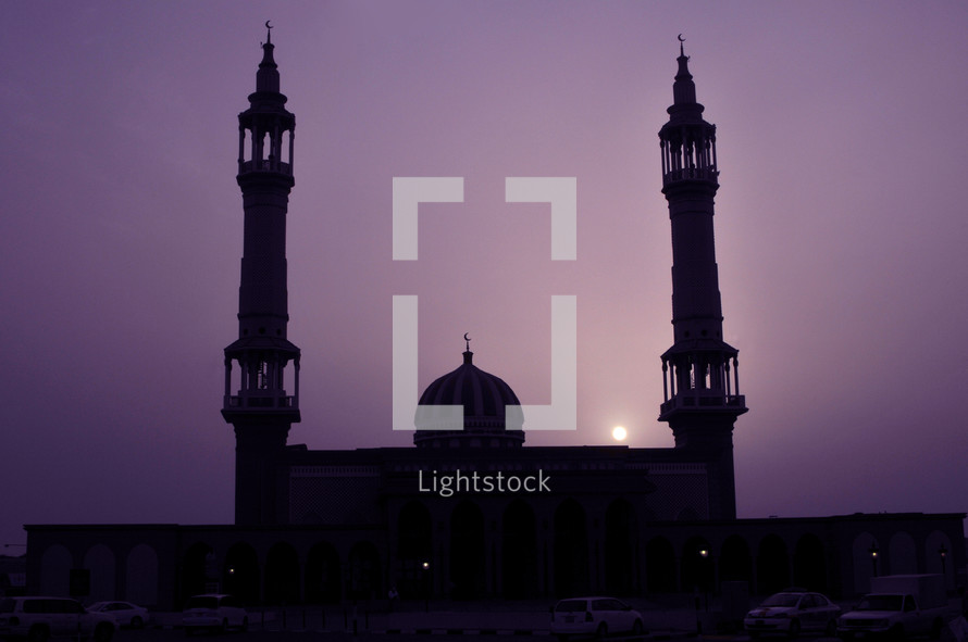 mosque towers at dusk