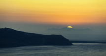 Orange sunset in oia, Santorini island, Greece