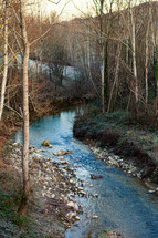 The Pesa River runs through the town of Sambuca, municipality of Tavarnelle Val Di Pesa, Tuscany, Italy. Typical winter landscape.