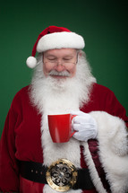 Santa holding a mug 