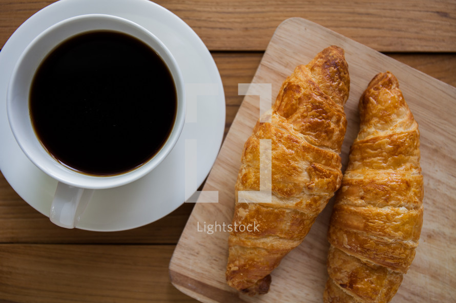 coffee cup and croissants 