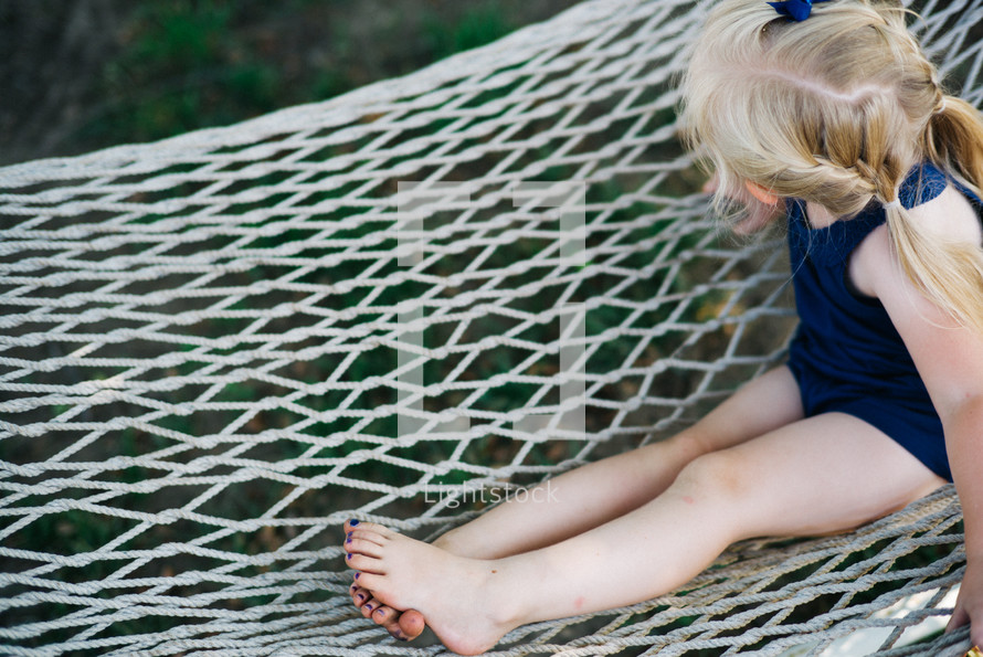 girl child in a hammock 