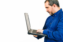 man holding a laptop on a white background