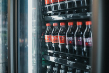 cokes in a refrigerator 