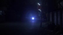 motorcycle passing by at night 