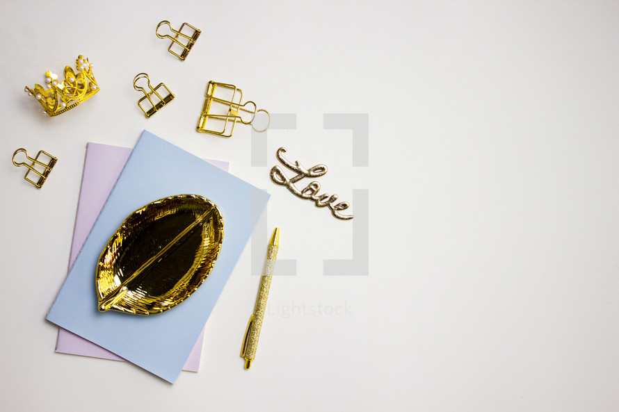 Gold desk supplies and holder with the word love