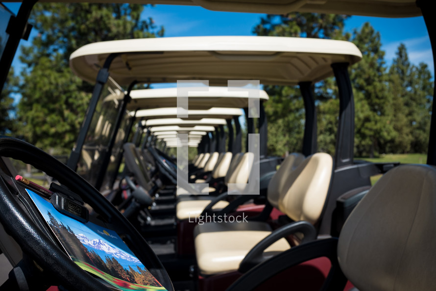 row of golf carts 