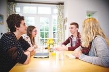 teens discussing scripture at a Bible study 