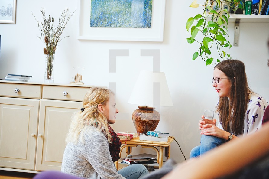 teen girls in conversation at a youth group 