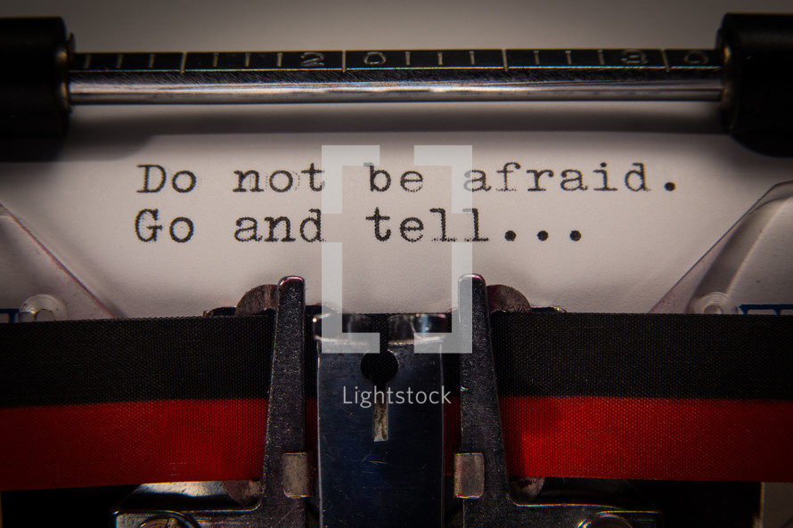 Excerpt from Matthew 28:10, "Do not be afraid. Go and tell...", text typed out on a vintage typewriter.