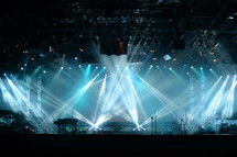 strobe lights on stage at a concert 