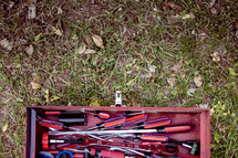 a red toolbox full of tools 