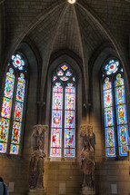 arched stone ceiling and stained glass windows 