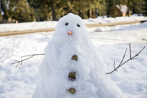 snowman outdoors in winter 