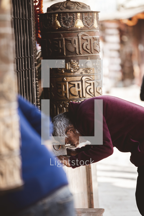 prayers at a temple in Tibet