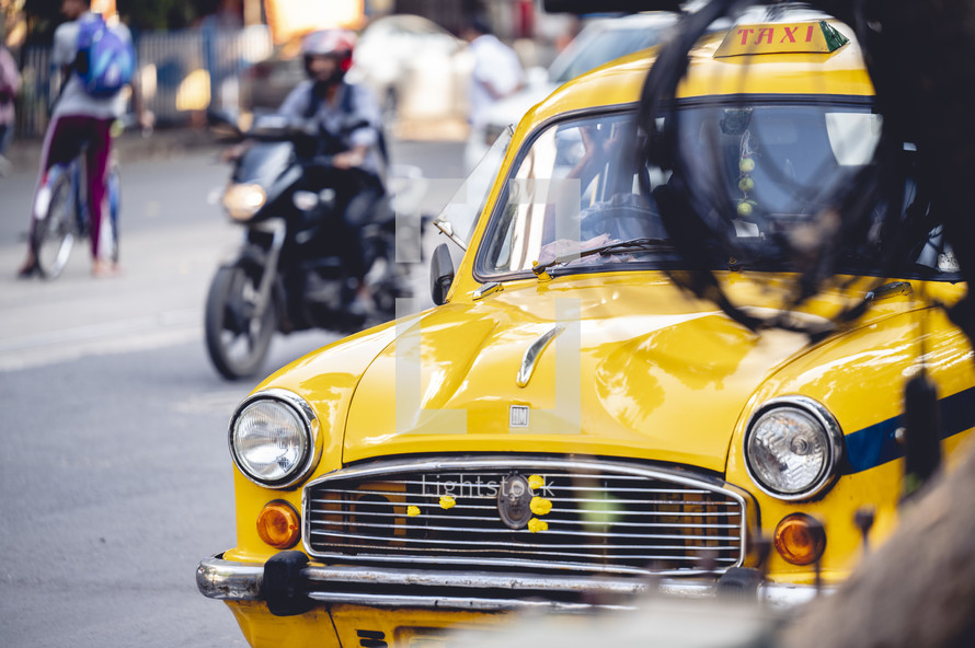 Yellow taxi in Kolkata, India.