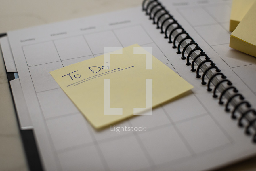 Notebook planner with sticky notes for to do
