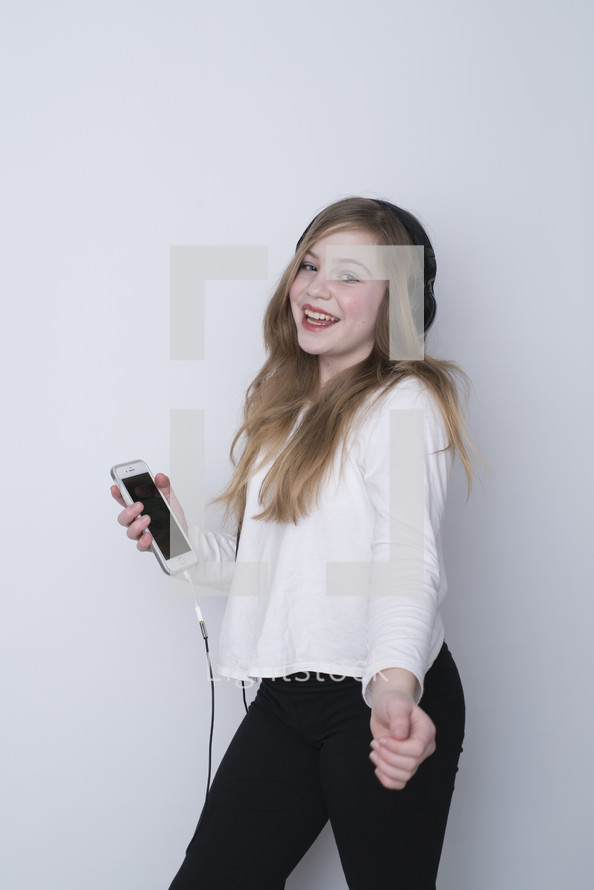 teen girl listening to music 