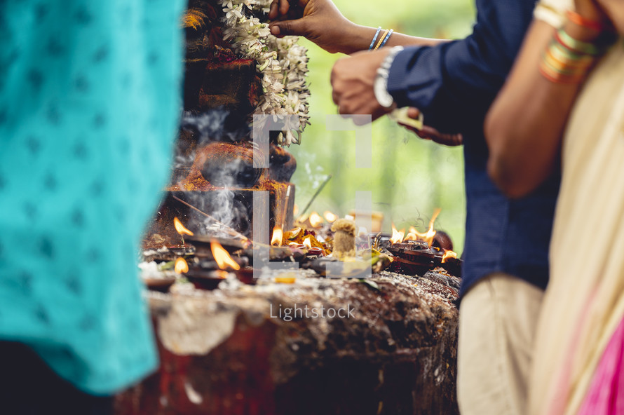 Hindu worshipers burning incense and worshiping Hindu gods at The Varaha Lakshmi Narasimha Hindu temple – Simhachalam in Vizag Visakhapatnam, India