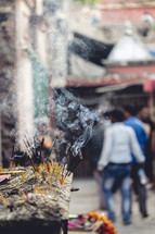 Incense burning at the Taraknath Hindu temple in India.