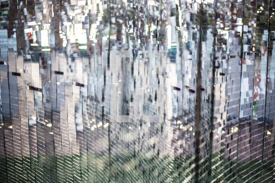 reflections in pieces of mirrored glass