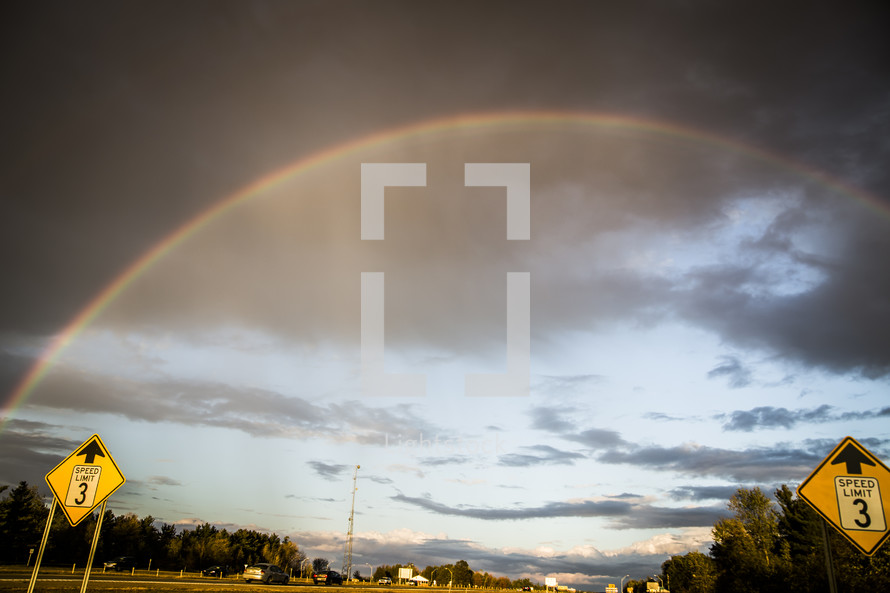 rainbow over a highway 
