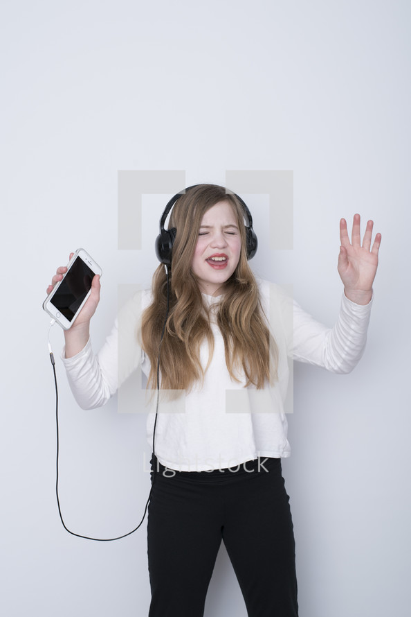 teen girl listening to music 