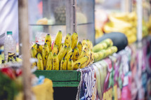 Bananas being sold out of fruit stand in Kolkata, India.