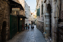 kids on a narrow street in Jerusalem 