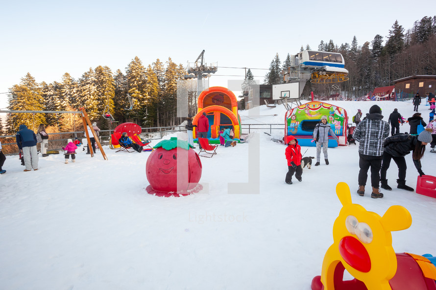 Abetone, Italy - December 19, 2023: famous mountain location in Tuscany. SChildren's playground set up in the snow.